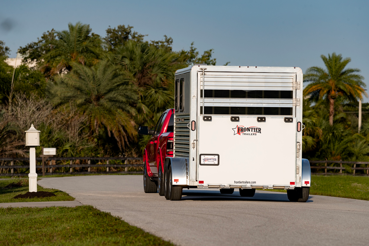 Colt Bumper Pull Slant Load Series 2h Driving Down Road